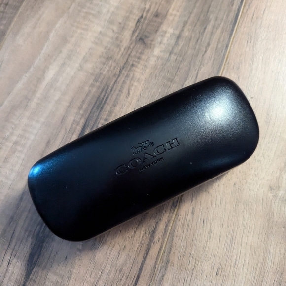 Coach Sunglasses case. Black leather with felt interior.